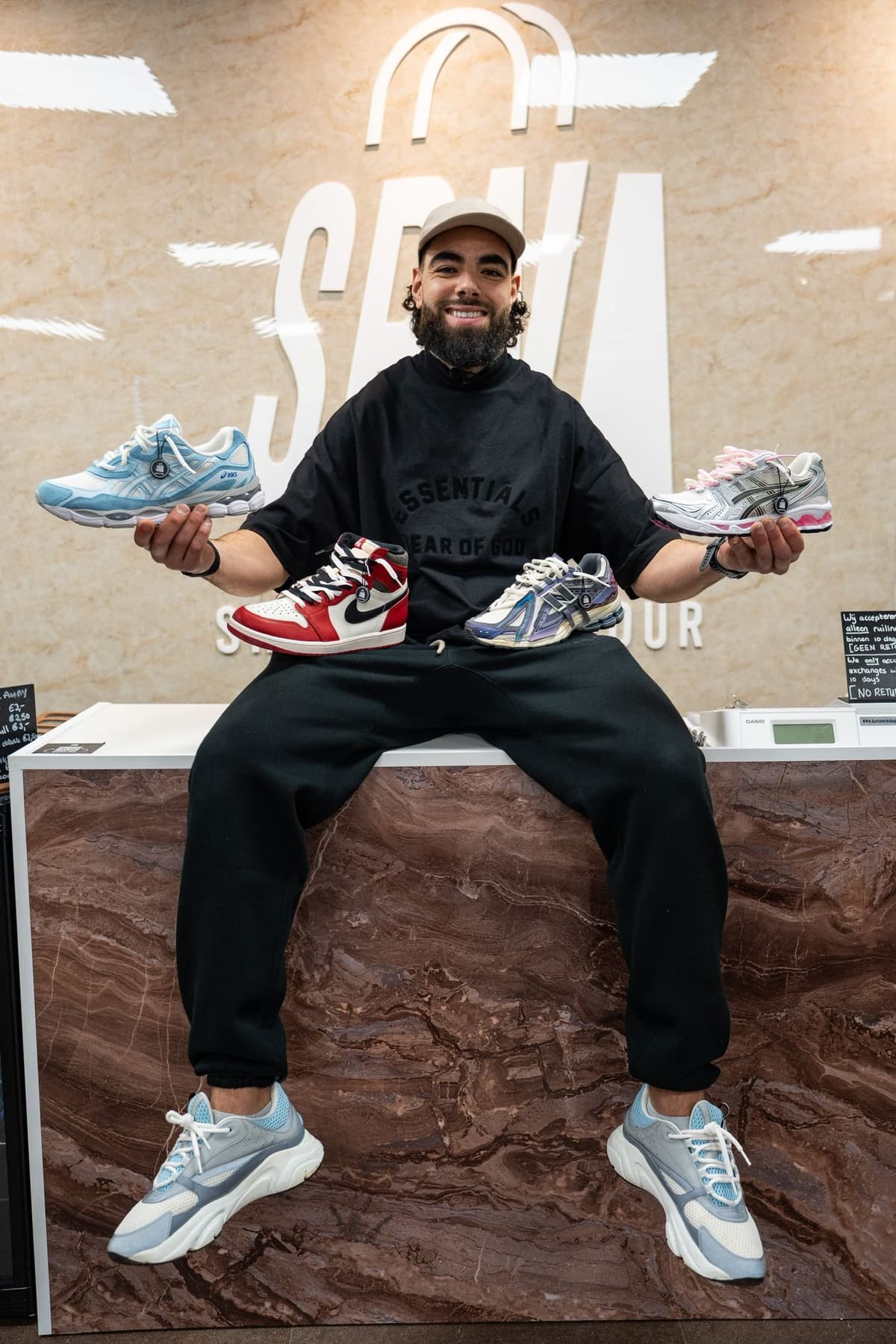 Nourredine with sneaker collection
